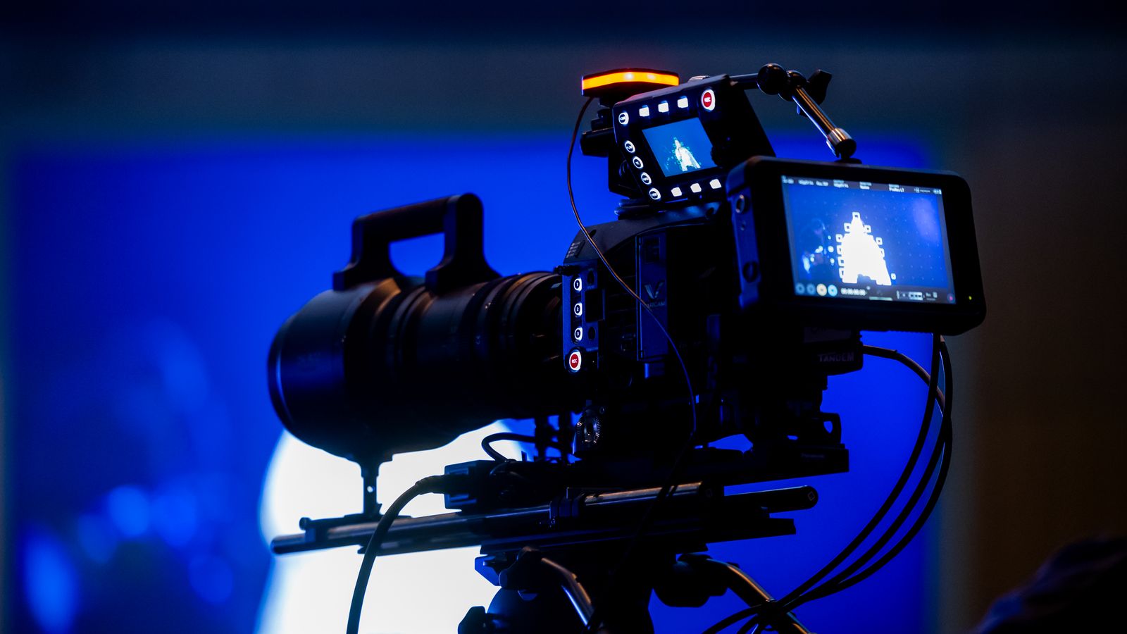 Professional cinema camera rig on a darkened film set, the kind of 4K cinematic footage Seedance 2.5 is built to produce